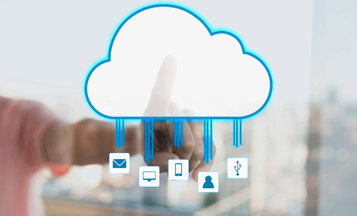 TechPragna concept image showing a person touching a digital cloud icon representing cloud computing and data synchronization.